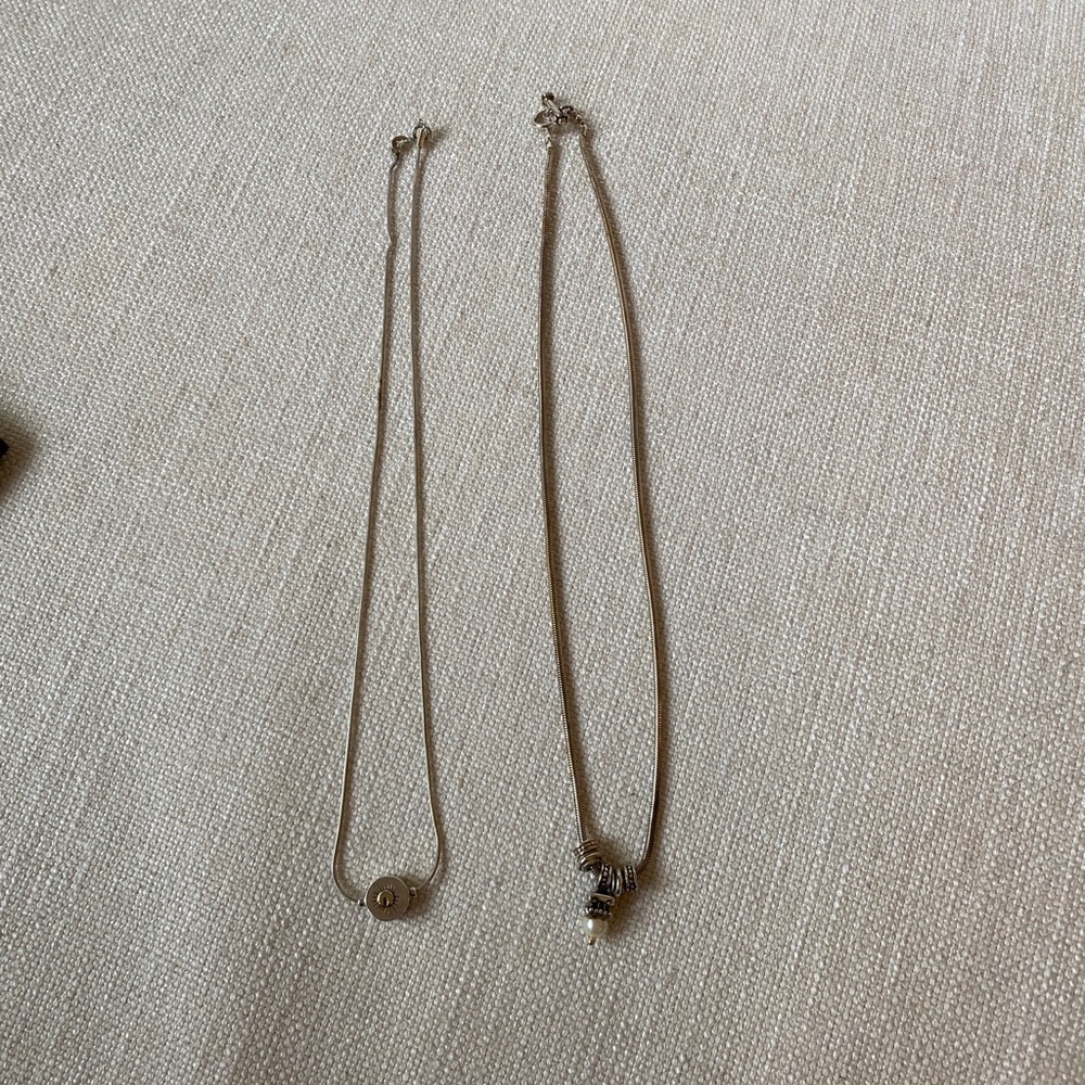 2 necklaces and 1 pair of earrings